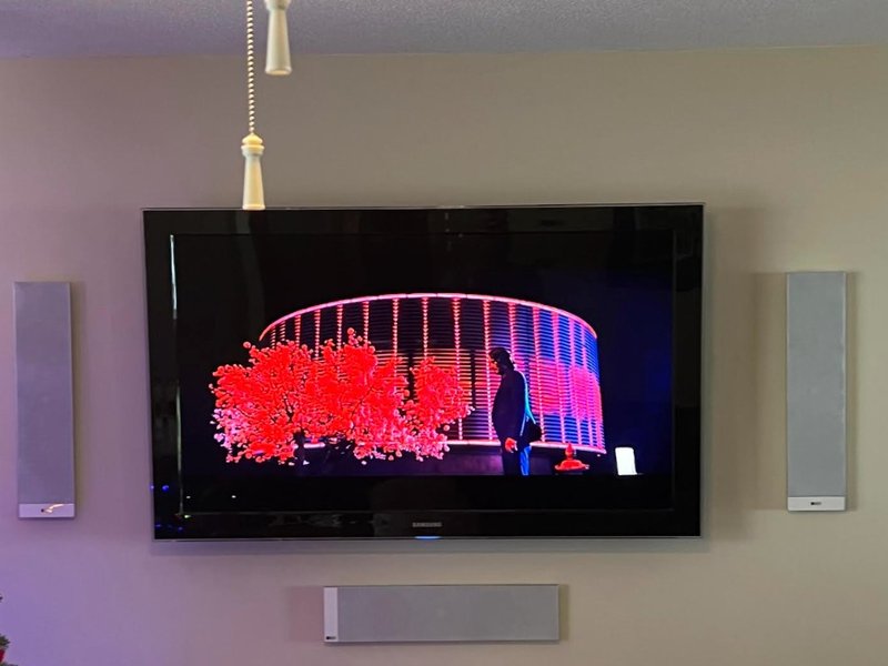 Samsung TV with Wall-Mounted Speakers
