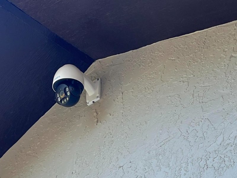 Outdoor PTZ Camera on Stucco Wall