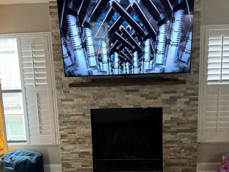 TV Above Ledger Stone Fireplace